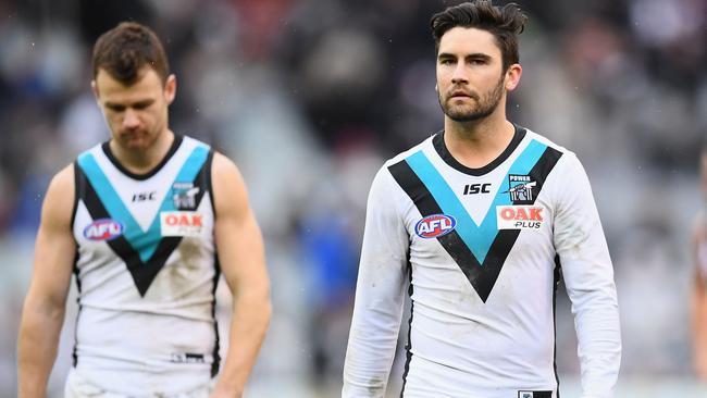 WIN-GONE? Chad Wingard (right) and teammate Robbie Gray trudge from the MCG after the round 22 loss to Collingwood. Picture: Quinn Rooney / Getty