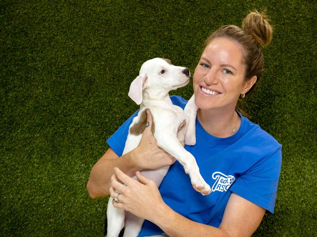 Olympic swimmer Emily Seebohm with 12-week-old 'Hope' the Bull Arab Cross at RSPCA Wacol, Friday, April 28, 2023 - Picture: Richard Walker