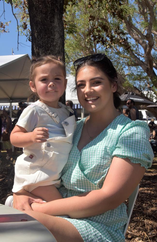 Mikaylah and Oaklee-Mae were among thousands of Territorians enjoying the 2023 Greek GleNTi on the Darwin Esplanade. June 10, 2023. Picture: Sierra Haigh