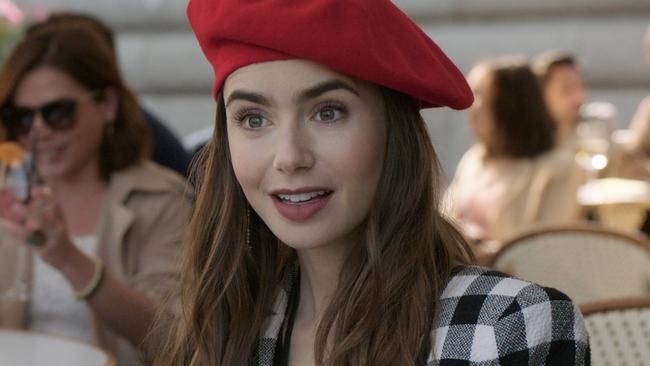 EMILY IN PARIS (L to R) LILY COLLINS as EMILY in episode 103 of EMILY IN PARIS. Cr. COURTESY OF NETFLIX Â© 2020