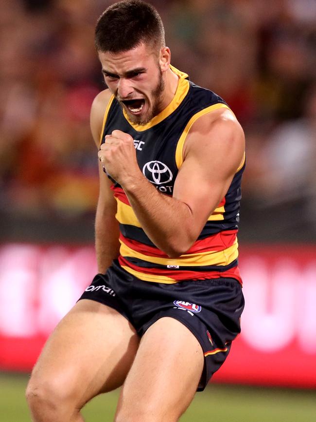 Lachlan Murphy of the Crows celebrates a goal against Richmond. Picture: James Elsby/AFL Media/Getty Images