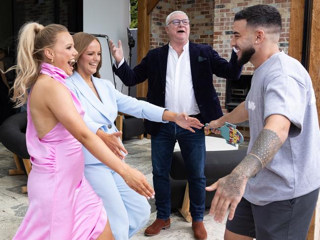 Portelli embracing Block 2024 winners Maddy and Charlotte. Picture: Channel 9