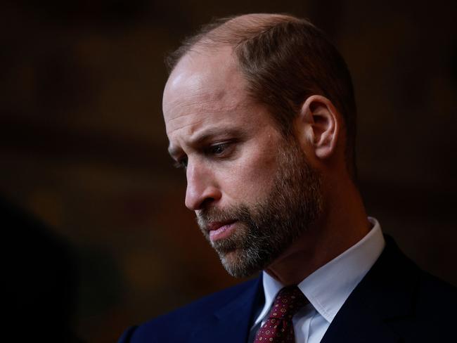 TOPSHOT - Britain's Prince William, Prince of Wales, Co-Patron of the âJewel of Arabia Expeditionâ reacts as he attends the launch of the expedition at the Royal Geographical Society, in London, on November 25, 2024. The Expedition aims to raise awareness amongst young people both in and outside of Oman of the value of Omanâs natural heritage and biodiversity as well as the environmental challenges the country and the wider world face. (Photo by BENJAMIN CREMEL / POOL / AFP)