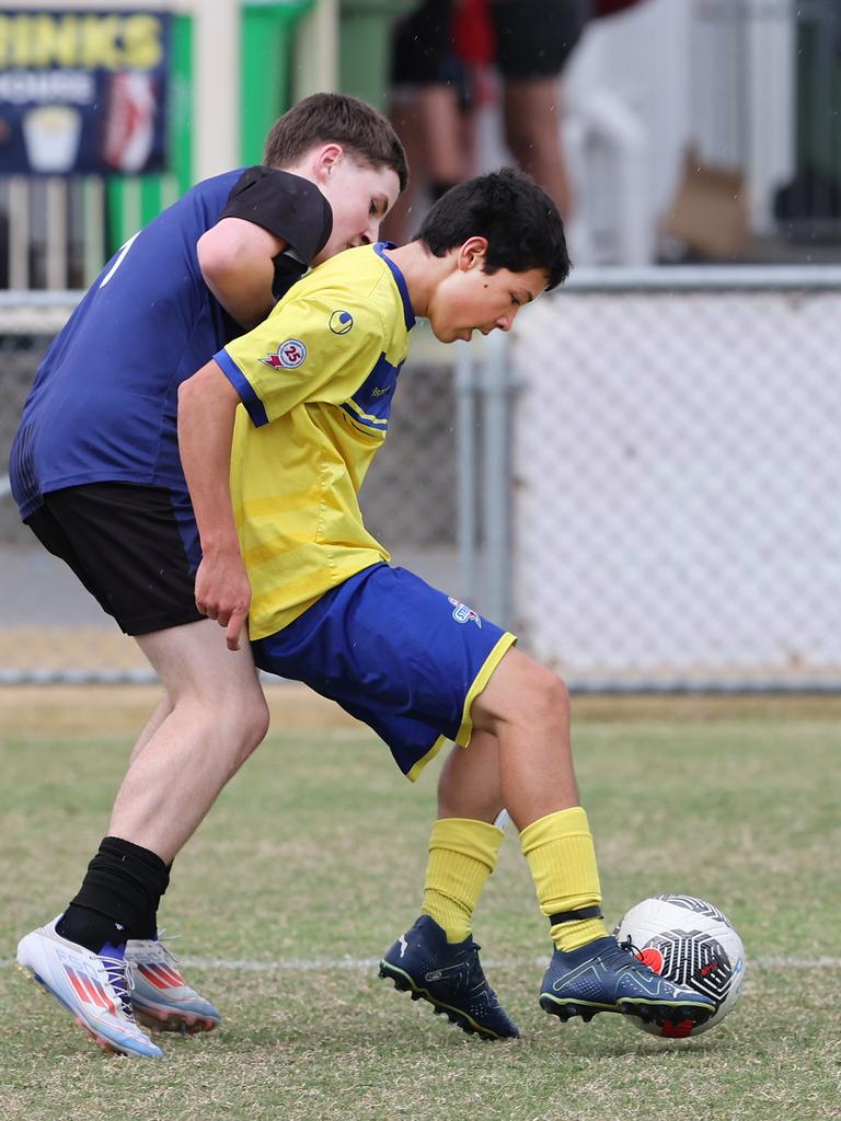 Premier Invitational Football 2024 tournament at Glennon Park Nerang. Field 1...Selwyn Utd (blue) V Brisbane Strikers (Yellow). Picture Glenn Hampson