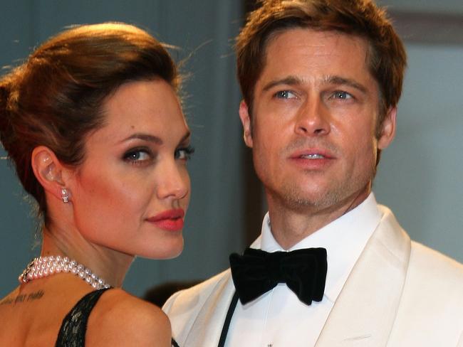 VENICE, ITALY - SEPTEMBER 02:  Angelina Jolie and Brad Pitt attend the The Assassination of Jesse James by the Coward Robert Ford premiere on the Day 5 of the 64th Annual Venice Film Festival on September 2, 2007 in Venice, Italy.  (Photo by MJ Kim/Getty Images)