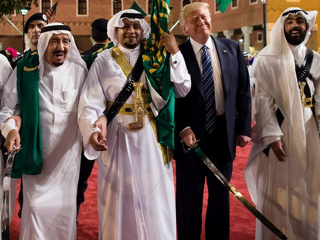 US President Donald Trump and Saudi Arabia's King Salman bin Abdulaziz al-Saud dance with swords at a welcome ceremony ahead of a banquet at the Murabba Palace in Riyadh. Picture: AFP / Saudi Royal Palace.