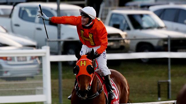 Cairns Cup winner The Harrovian with jockey Robert Thompson. PICTURE: STEWART MCLEAN.