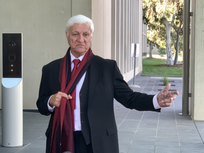 Bob Katter with mysterious scribblings on his hand.