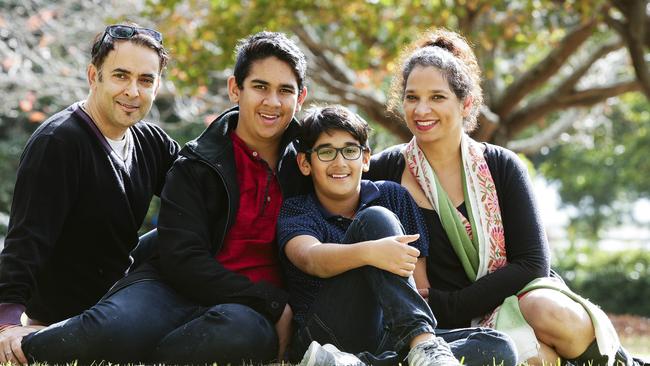 Raj Suri and Ruchi Motial-Suri with their sons Vir Suri, 15, and Kavi Suri, 10, in Haberfield. Picture: Justin Lloyd