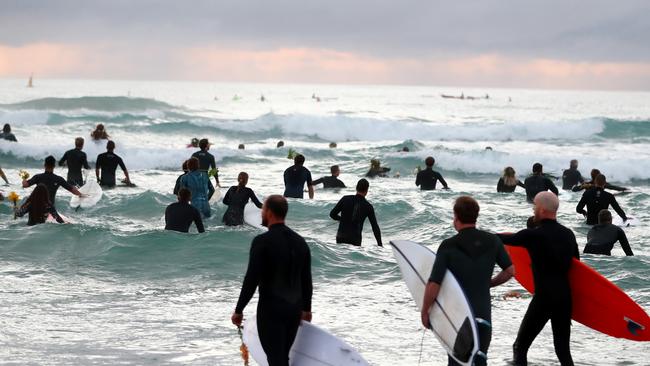 GOLD COAST, AUSTRALIA - JULY 11: Surfers paddle out in memory of Alex 'Chumpy' Pullin on July 11, 2020 in Gold Coast, Australia. Australian Winter Olympic Games Snowboarder Alex 'Chumpy' Pullin died on Wednesday 8 July in a drowning accident while spearfishing at Palm Beach on the Gold Coast, aged 32. (Photo by Chris Hyde/Getty Images)