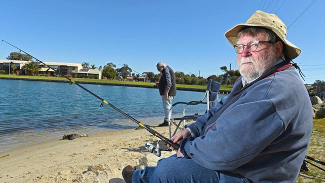 Mike Nicholls (background) and Sandy Blythman from Tanunda fishing at West Lakes Beach near Bower Road. Picture: Tom Huntley