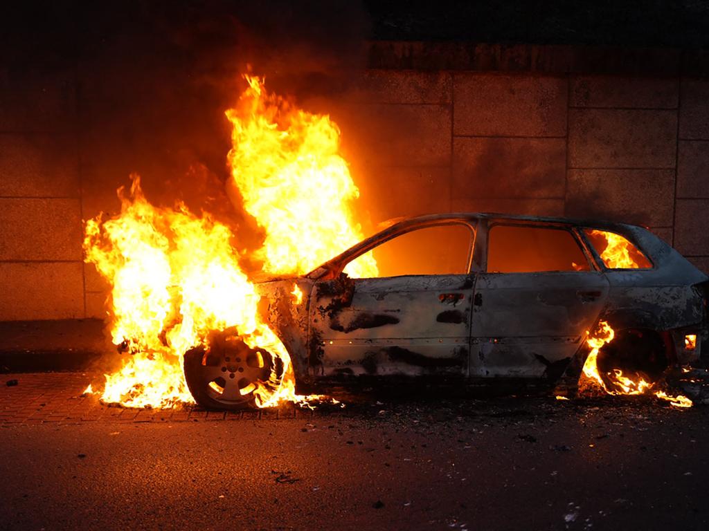 A burning car in Nanterre after French police killed a teenager who refused to stop for a traffic check in the city. Picture: AFP