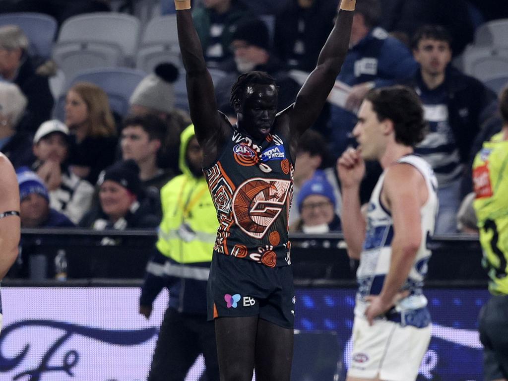 Leek Aleer celebrates on the final siren against Geelong. Picture: Martin Keep/AFL Photos/Getty Images.