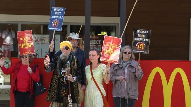 Protests still going against McDonalds in Tecoma. Photo of these protestors outside Maccas. One of the protestors will be Belgrave wizard Baba Desi. Can you please get some separate photos of Baba. Picture: Stuart Milligan