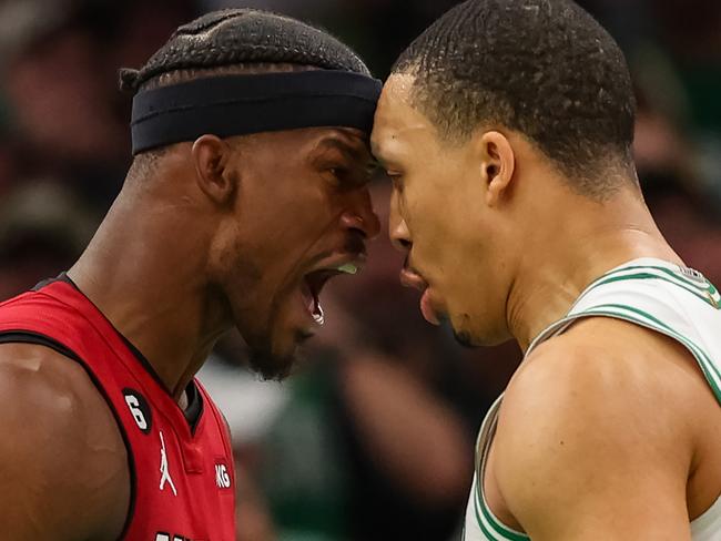 BOSTON, MASSACHUSETTS - MAY 19: Jimmy Butler #22 of the Miami Heat exchanges words with Grant Williams #12 of the Boston Celtics during the fourth quarter in game two of the Eastern Conference Finals at TD Garden on May 19, 2023 in Boston, Massachusetts. NOTE TO USER: User expressly acknowledges and agrees that, by downloading and or using this photograph, User is consenting to the terms and conditions of the Getty Images License Agreement. (Photo by Adam Glanzman/Getty Images)