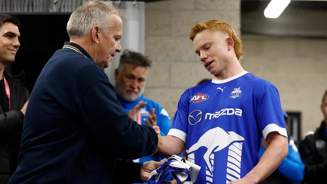 Blake Drury receives his jumper before his first AFL game in round 8. Picture: Michael Willson/AFL Photos via Getty Images