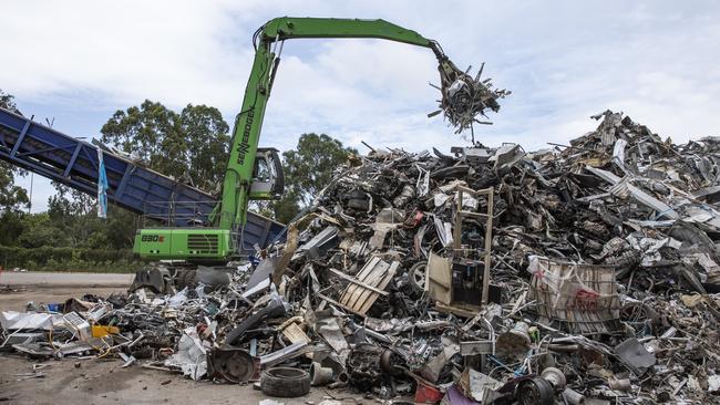 Machinery in action at the Wanless site. Picture: Mark Cranitch