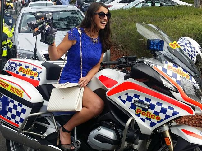 The woman who pushed over a policeman at the races has updated her Facebook profile pic to this.