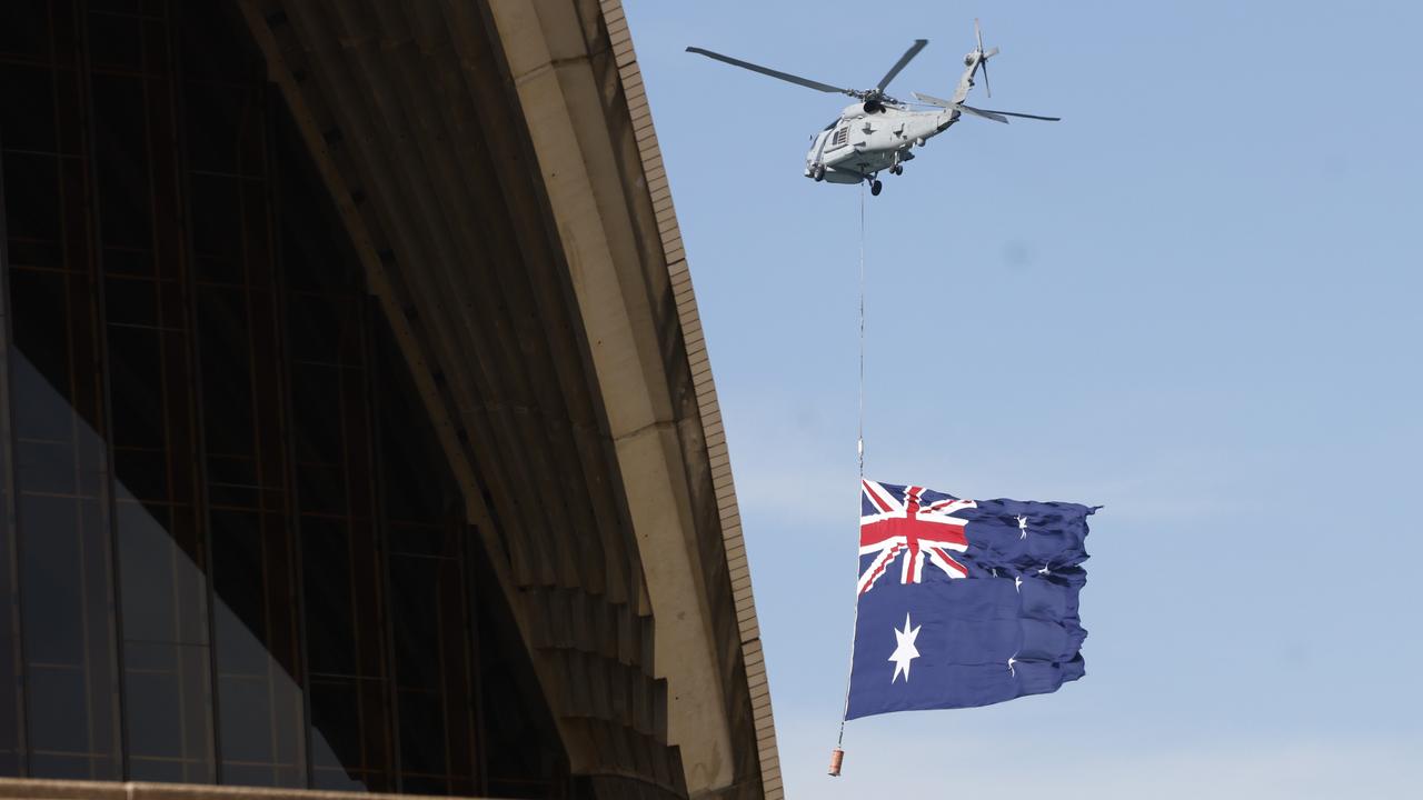 The Aussie flag was displayed by a helicopter at the Sydney Opera House. Picture: NewsWire / Damian Shaw