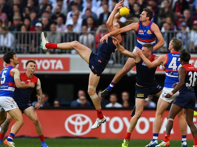 Ben Brown of the Demons competes for a mark with Zaine Cordy of the Bulldogs. Picture: Daniel Carson/AFL Photos via Getty Images