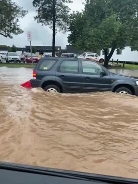 Kingaroy car trapped in floodwaters