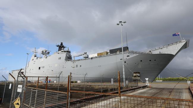 The HMAS Adelaide, a Royal Australian Navy Canberra-class landing helicopter dock ship, moored at the Cairns Wharf. Picture: Brendan Radke