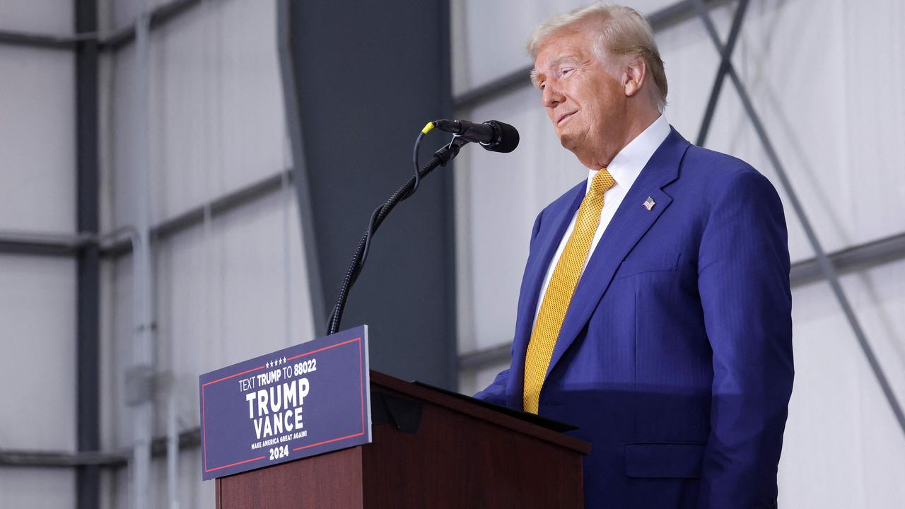 Republican presidential nominee, former U.S. President Donald Trump, remarks on border security inside an aeroplane hanger at the Austin-Bergstrom International Airport. Picture: Getty