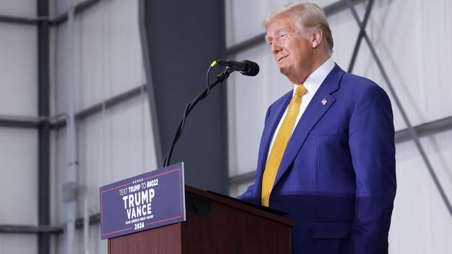 Republican presidential nominee, former U.S. President Donald Trump, remarks on border security inside an airplane hanger at the Austin-Bergstrom International Airport. Picture: Getty