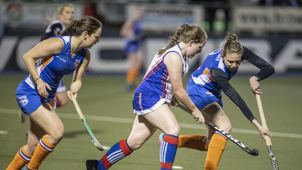Maggie Pembroke for Newtown, Jessica Kibble for Rangeville and Alex Young for Newtown. A1 Women , Toowoomba Hockey grand final. Newtown vs Rangeville. Saturday, September 10, 2022. Picture: Nev Madsen.