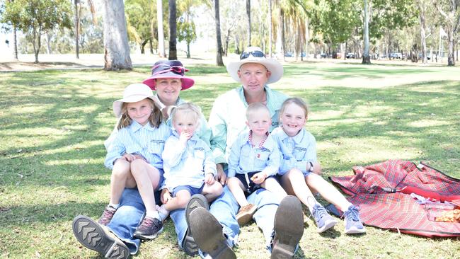 Former truck driver Amanda Reihl and partner Mattew Saville, and their children, Katie, Hannah, Harry, and Ellie-May, watching the trucks roll into Gatton.