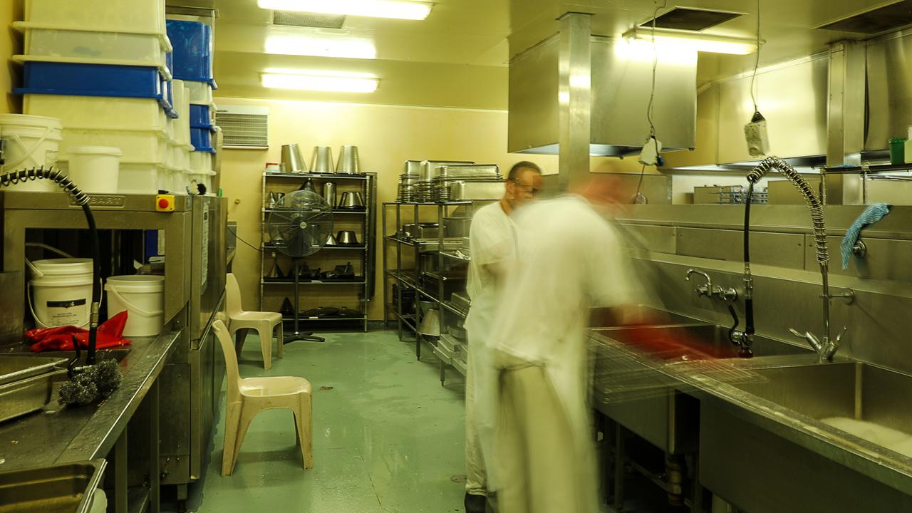 Prisoners working in the kitchen at Maryborough Correctional Centre.