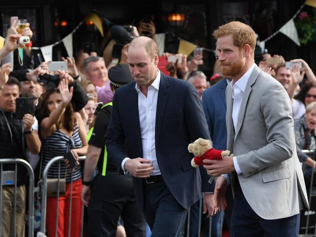 Prince Harry and Prince William, Duke of Cambridge embark on a walkabout ahead of the royal wedding. Picture: Getty