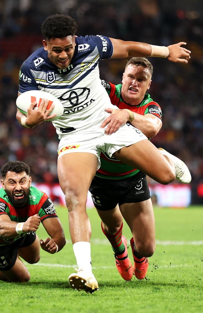 Viliami Vailea of the Cowboys breaks tackles on his way to score a try during the round 11 NRL match between South Sydney Rabbitohs and North Queensland Cowboys at Suncorp Stadium, on May 18, 2024, in Brisbane, Australia. (Photo by Hannah Peters/Getty Images)