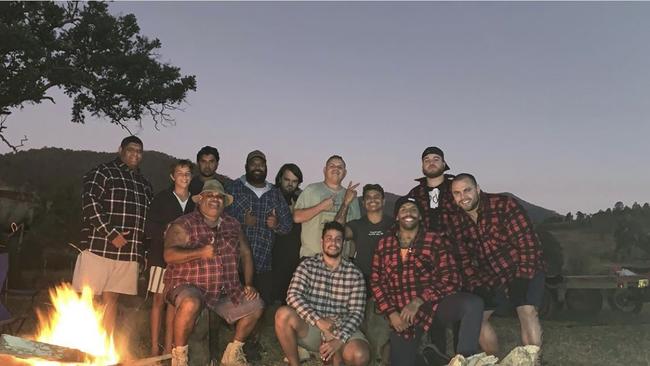 The photo of Josh Addo-Carr (third from right) and Latrell Mitchell (fourth from right) during a camping trip. Picture: Instagram