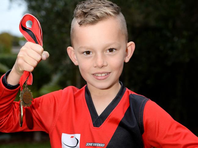 Sports Star: 9 year-old Mitchell Gillan of Knoxfield, is AFL obsessed and is nominated for our sports star award in recognition of his sportmanship. Mitchell plays in the under 9 Knox Eagles football team and was presented with an ANZAC Day footy medal. Picture: Steve Tanner