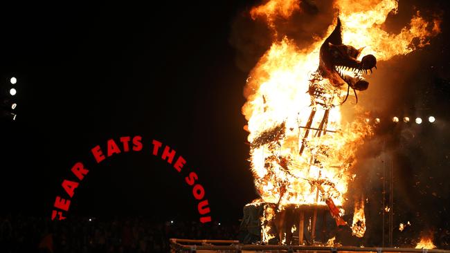 The Ogoh-Ogoh goes up in an impressive ball of flames in the dramatic finale to Dark Mofo. Pictures: LUKE BOWDEN