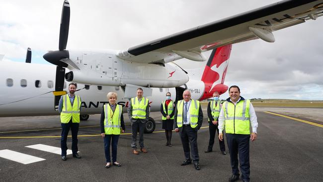 Representatives from Qantas, Grant Council, Mount Gambier Council and MP Tony Pasin welcomed the first QantasLink flight at Mount Gambier Regional Airport in March. Picture: Jessica Ball