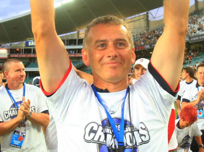 Jets coach Gary Van Egmond with the trophy at the end of the Newcastle Jets v Central Coast Mariners A-League Grand Final at the SFS in Sydney.