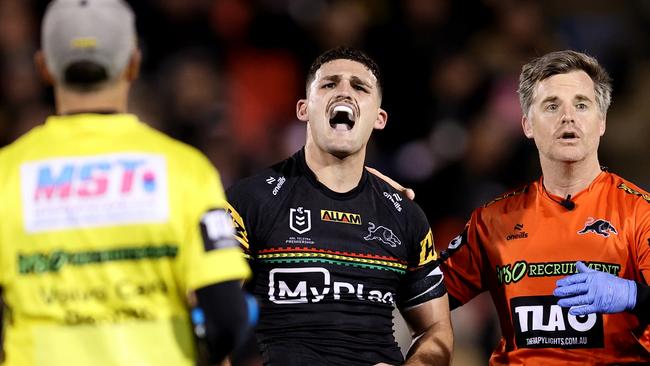 PENRITH, AUSTRALIA - AUGUST 15: Nathan Cleary of the Panthers reacts after taking a knock to his shoulder during the round 24 NRL match between Penrith Panthers and Melbourne Storm at BlueBet Stadium, on August 15, 2024, in Penrith, Australia. (Photo by Brendon Thorne/Getty Images)