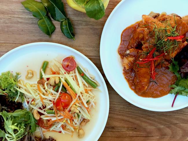 KukThai’s papaya salad and Chu Chee Salmon. Picture: Jenifer Jagielski