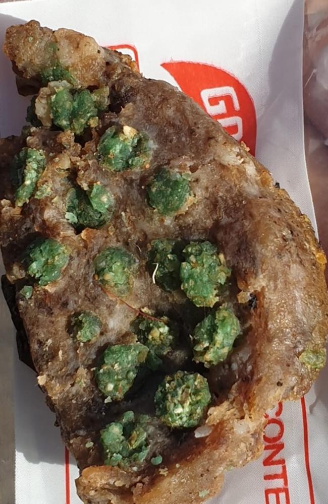 A piece of hamburger or processed meat impregnated with rat or slug poison pellets found in Mona Vale. Picture: Facebook