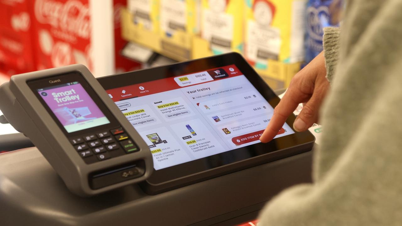 A Coles smart trolley digital screen showing specials and running total of spend. Picture: Hamish Blair