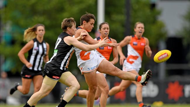 Courtney Gum of the Giants kicks the ball during the Round 3 AFLW match between the Collingwood Magpies and the Greater Western Sydney (GWS) Giants at Olympic Park Oval in Melbourne, Sunday, February 18, 2018. (AAP Image/Joe Castro) NO ARCHIVING, EDITORIAL USE ONLY
