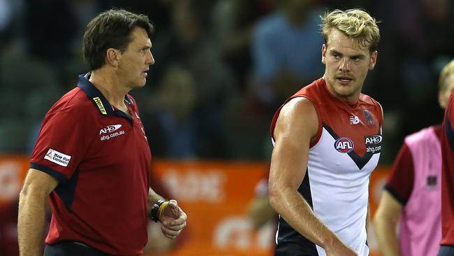 Melbourne coach Paul Roos speaks with Jack Watts.