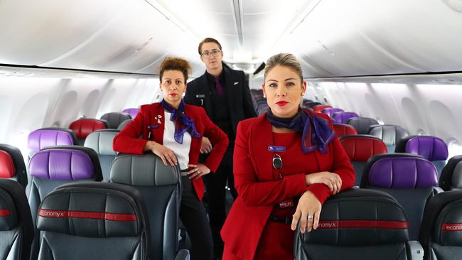 Virgin Australia staff Marcella Pirritano, Jason Arends and Jessica Turnbull at Melbourne in April. Picture: Aaron Francis