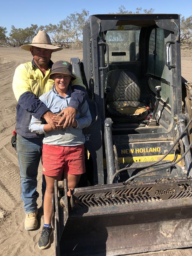 Danielle with her father, Steve, out fencing. Picture: Supplied