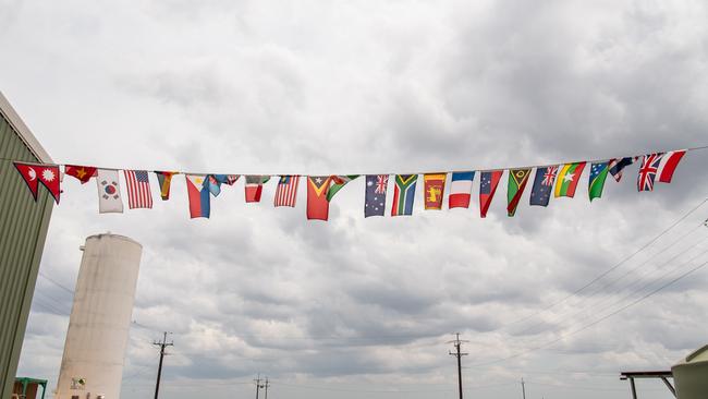 Flags representing the employer mix at Humpty Doo Barramundi. Picture: Pema Tamang Pakhrin