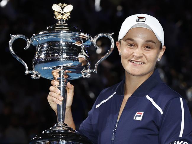 MARCH 23, 2022: World number 1 and three-time Grand Slam winner Ash Barty has announced her retirement from tennis at the age of 25. MELBOURNE, AUSTRALIA - JANUARY 29: Ashleigh Barty of Australia poses with the Daphne Akhurst Memorial Cup after winning her WomenÃ¢â¬â¢s Singles Final match against Danielle Collins of United States during day 13 of the 2022 Australian Open at Melbourne Park on January 29, 2022 in Melbourne, Australia.  (Photo by Darrian Traynor/Getty Images)