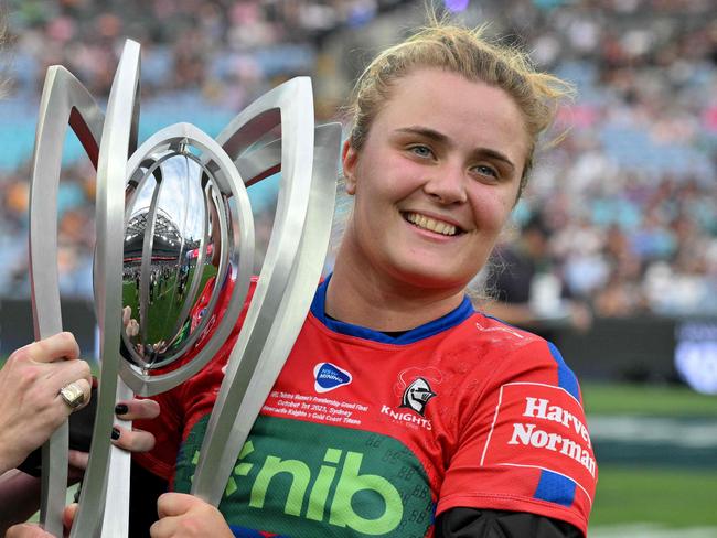 Tamika Upton (L) and Hannah Southwell (R) of the Knights pose with the Premiership Trophy after winning the women's 2023 NRL Grand Final between the Newcastle Knights and Gold Coast Titans at Accor Stadium in Sydney on October 1, 2023. (Photo by Izhar KHAN / AFP) / -- IMAGE RESTRICTED TO EDITORIAL USE - STRICTLY NO COMMERCIAL USE --