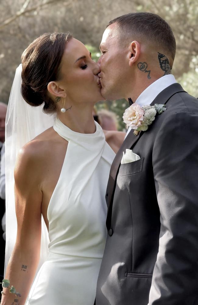 Todd Carney and Susie Bradley on their wedding day. Picture: Moments by Kait